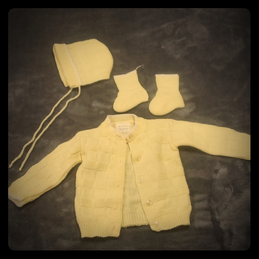 Brand new and never worn.Crocheted newborn set